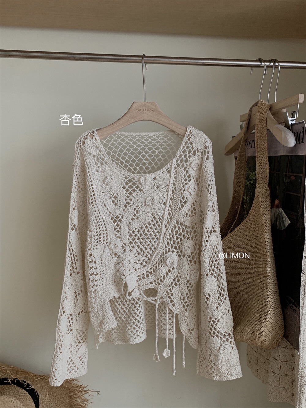 Vacation style hollow flower tassel round neck shirt