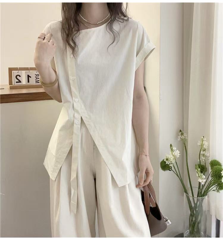 Hem slit fashionable design shirt for women in Europe summer new loose large size ins top