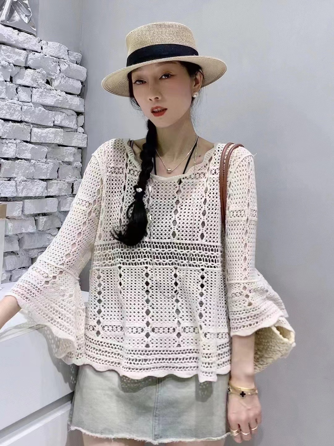 Flared sleeve hollow sweater for women in Europe summer new European products women's fashion and loose top