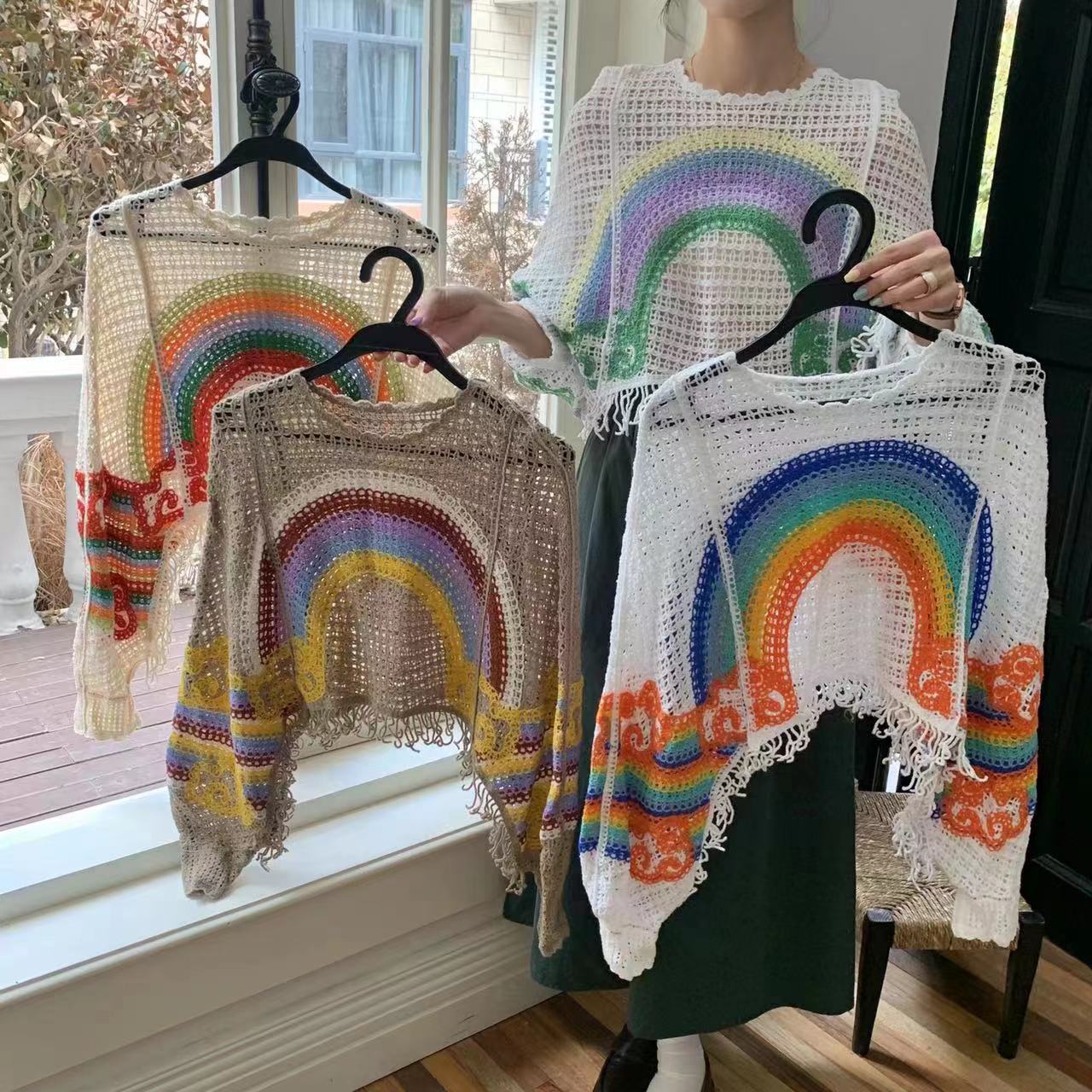 New spring and autumn hook-flower hollow sweater design sense tassel outer blouse round neck loose layer top