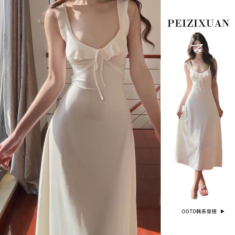 Gentle style white suspender backless dress for women in summer 2025 new seaside vacation temperament beautiful long skirt
