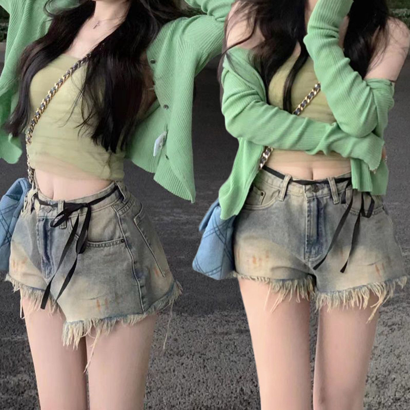 High-quality painted graffiti denim shorts for women in spring and summer hot girls with high waist slim retro A-line tassel fur edge hot pants trendy