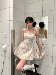 Original fabric features a flowy, soft dotted strap dress—women's summer new style, elegant, figure-flattering, and slimming mini skirt.