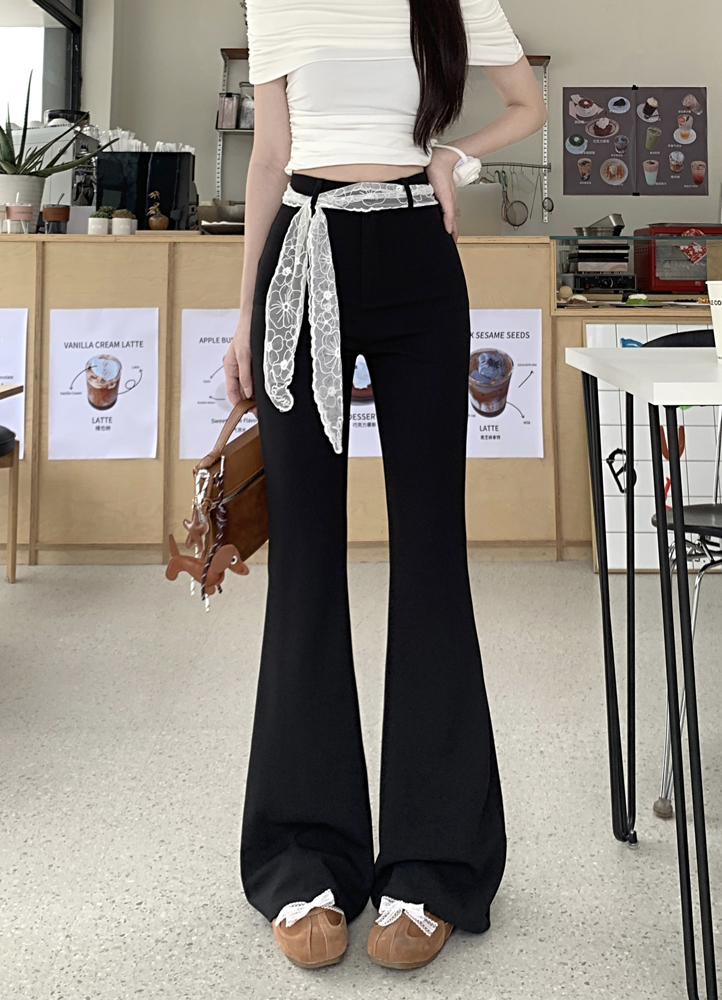 Real shot of black slim design, slightly drooping, slim casual pants, fashionable with scarf trousers