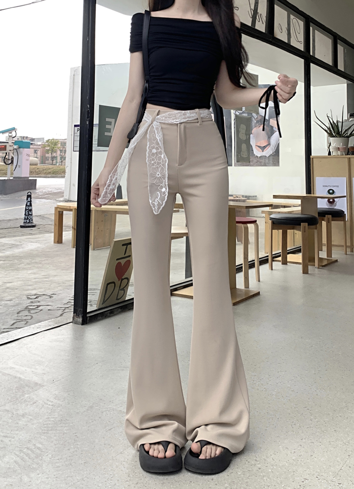 Real shot of black slim design, slightly drooping, slim casual pants, fashionable with scarf trousers
