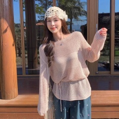Off-shoulder hollow-out long-sleeved knitted sweater for women—designer, niche, early spring, loose-fitting sun-protection cover-up, laid-back top.