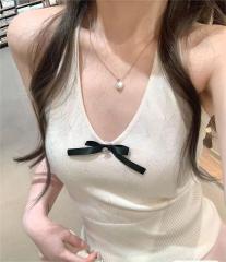 天貓質量純欲風蝴蝶結設計感小眾外穿吊帶背心女辣妹短款上衣