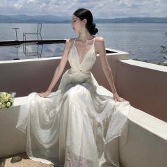 高級感露背連衣裙女純色蝴蝶吊帶裙海邊度假氛圍感重工大擺仙女裙