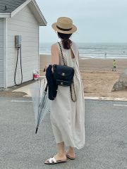 法式氣質無袖棉麻連衣裙女2025夏季新款設計感後背鏤空圓領背心裙