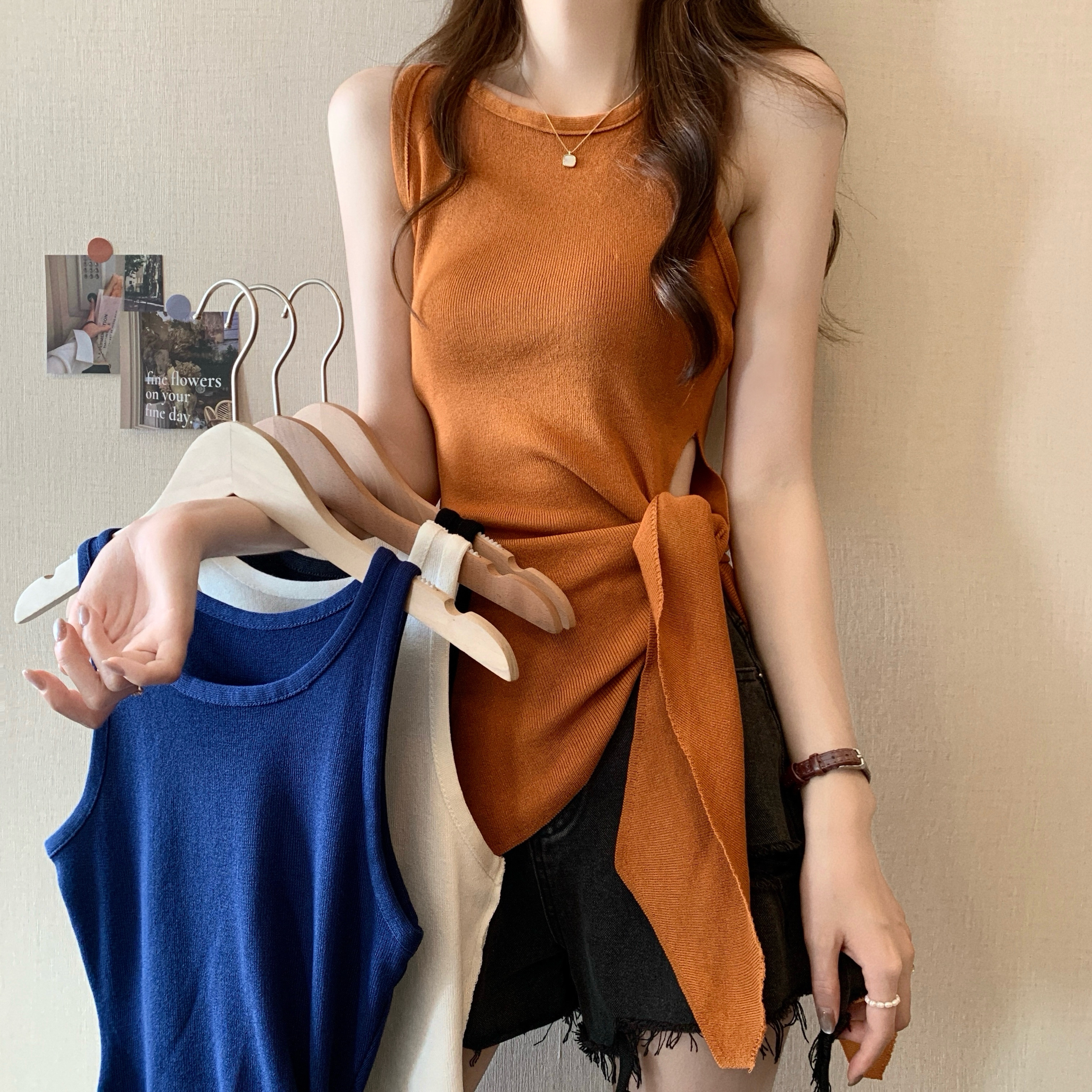 Real shot of the new Korean style design with irregular side bow sleeveless knitted sweater