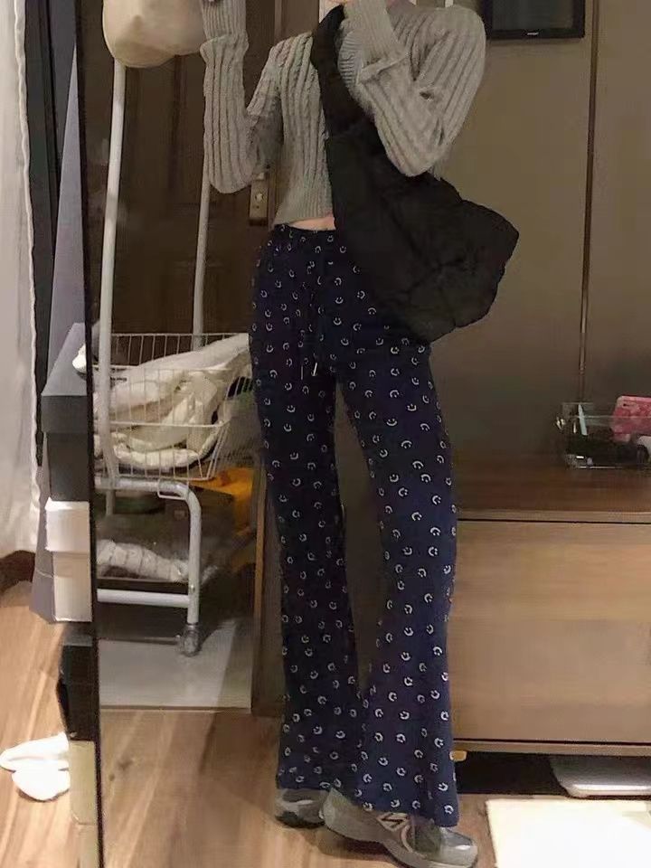New Korean niche design that is comfortable to the blue smiley pants, slightly flapping floor trousers, slim and high waist, legs long