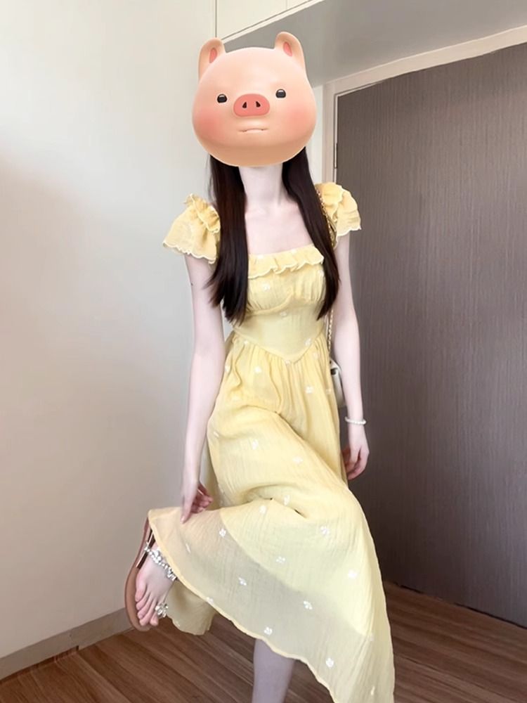 法式黃色小飛袖碎花連衣裙子女夏季2025新款收腰氣質公主度假長裙