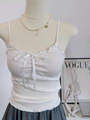 Lace-trimmed cotton-blend halter-neck top with bow-tie ties and delicate spaghetti straps