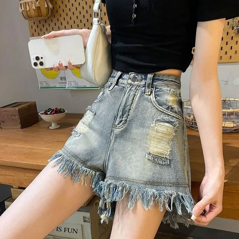 個性百搭破洞流蘇毛邊牛仔短褲女夏季新款高腰顯瘦寬鬆牛仔熱褲潮