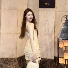 純欲少女感蝴蝶結系蕾絲吊帶波點修身連衣裙夏季新款抽褶皺包臀裙