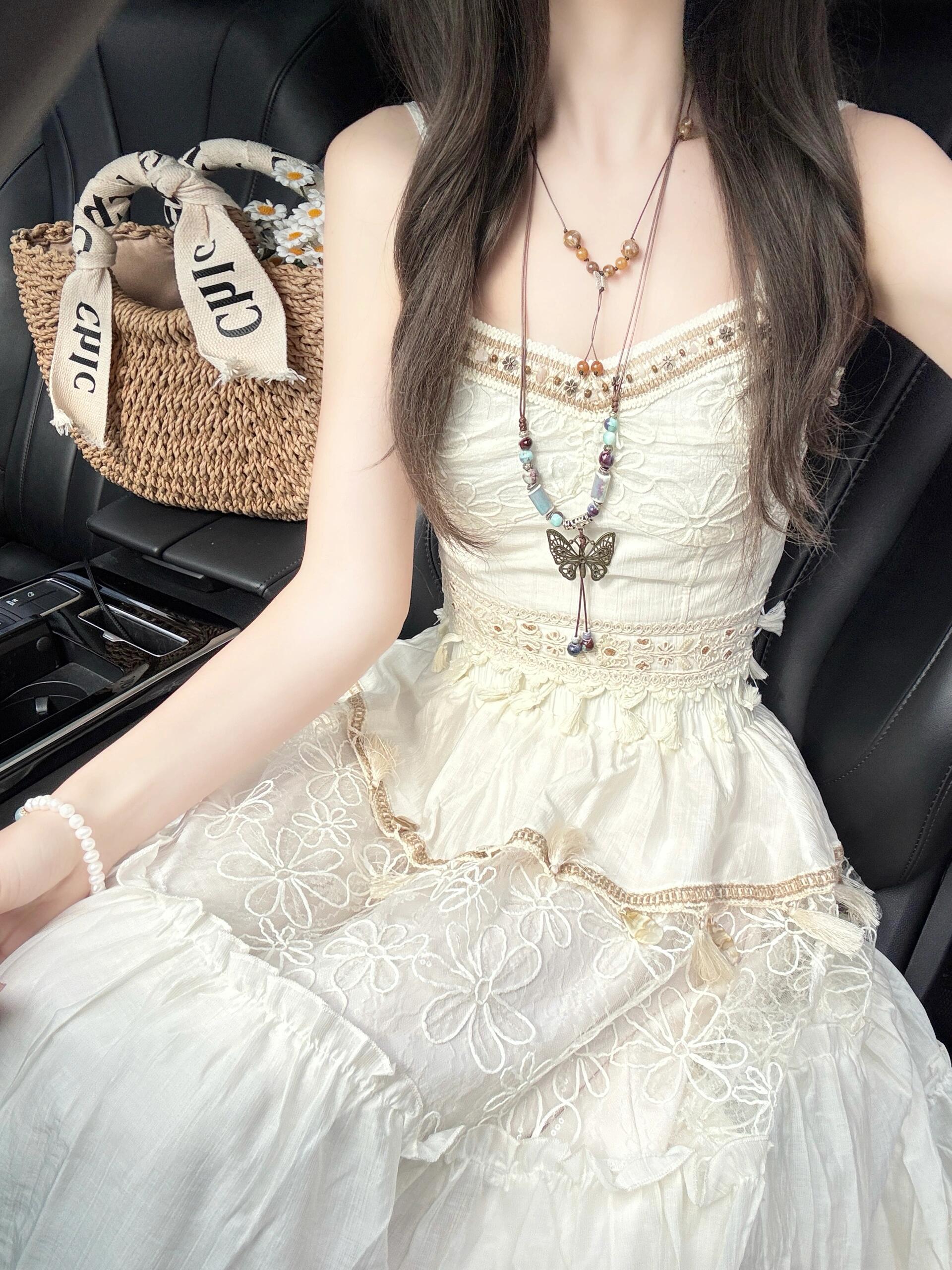 Unique and beautiful small suit age-reducing paired with a complete set of summer pure sling top tassel skirt two-piece set