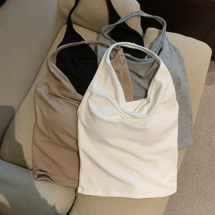 Real shot of spring halter neck fold suspender