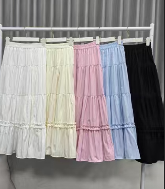 French solid color black ears layered cake skirt for women in spring 2025 high waist A-line pleated loose big hem skirt