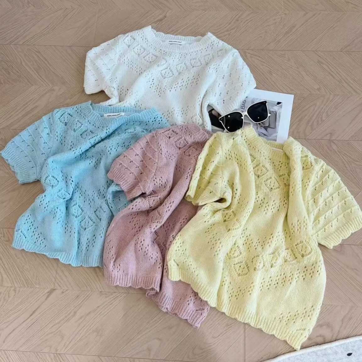 Ice silk fashion hook flower hollow short-sleeved sweater for women 2025 summer new loose slim round neck thin top