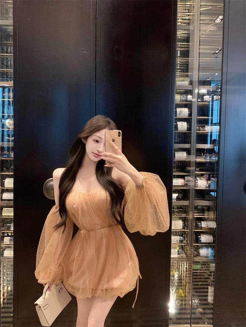 Real shot of one-shoulder puff sleeve dress with straps