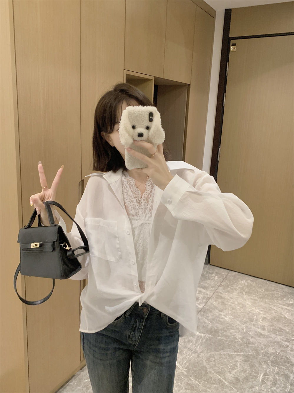 Real shot of 2025 spring new French mature style socialite temperament Rays vest twisted shirt two-piece set