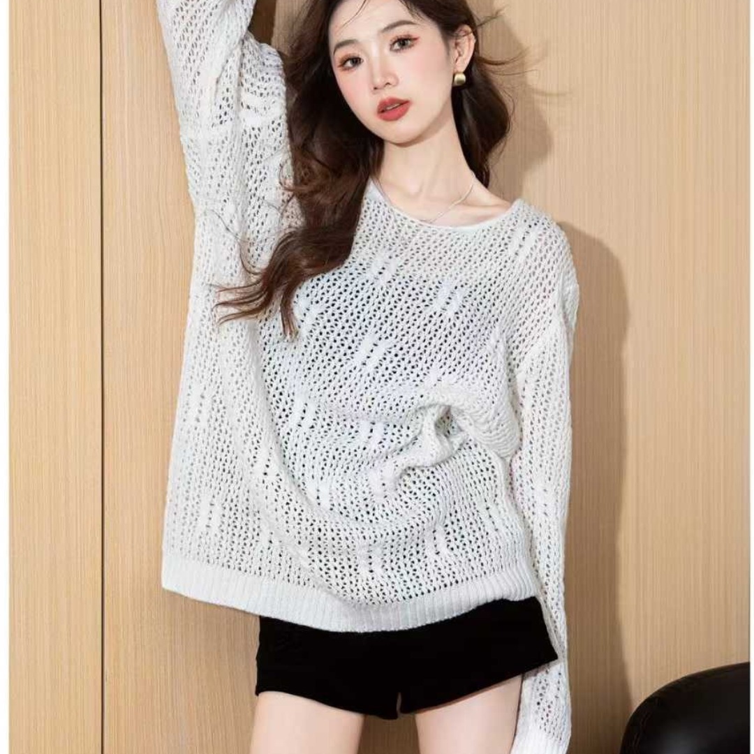 White design-sensing hollow long-sleeved sweater sunscreen blouse for women in spring and autumn new loose slimming and chic sweater
