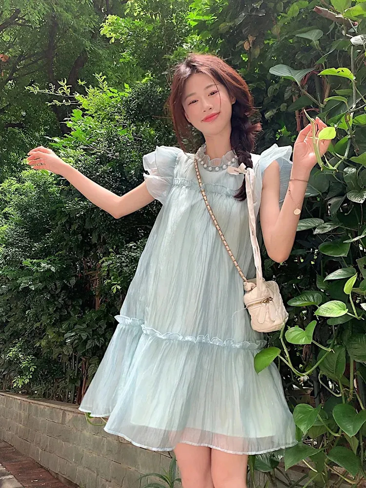 Shipped French sweet and cute age-reducing small flying sleeve dress for women in summer high-end style fairy skirt