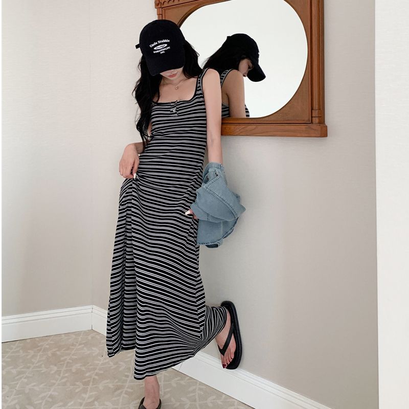 Has shipped Korean striped knitted vest dress for women in summer slim casual and versatile mid-length suspender skirt