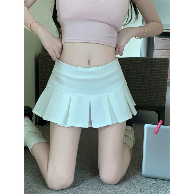 Has shipped American sexy low waist miniskirt for women's spring new A-line skirt anti-exposed sports pure and pleated