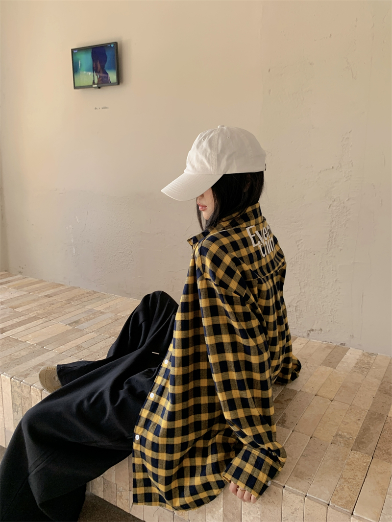 Real shot of fashionable yellow plaid loose lazy style large shirt jacket
