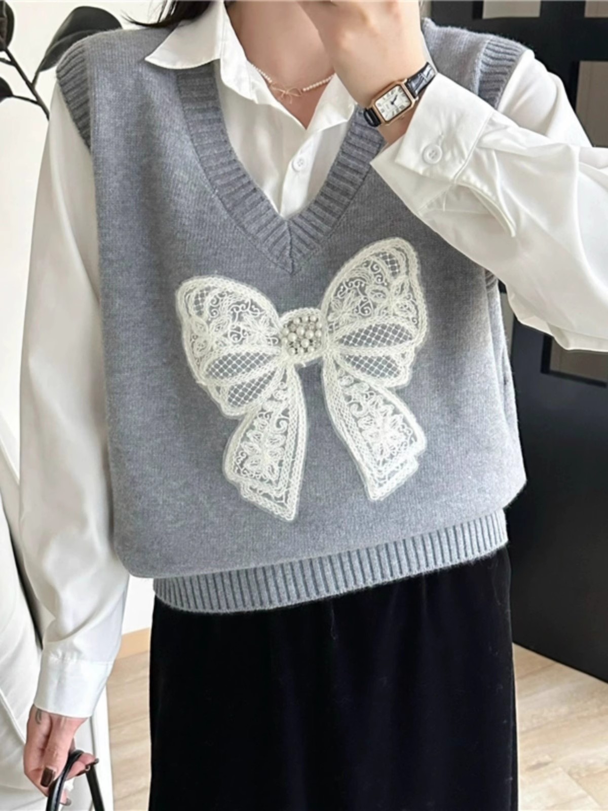 Bow design sense layered sleeveless women's knitted sweater vest women's new spring and autumn outdoor horse clip