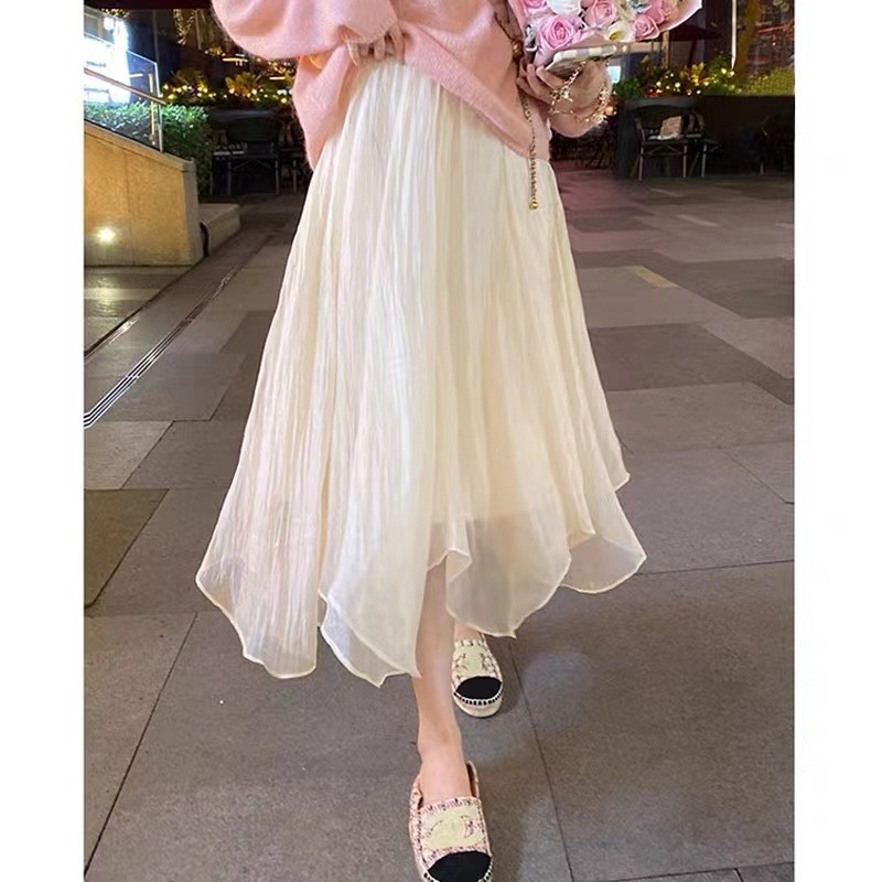 Ogensha irregular skirt for women in spring and autumn, high waisted A-line skirt, super fairy and fashionable pleated mid-length skirt