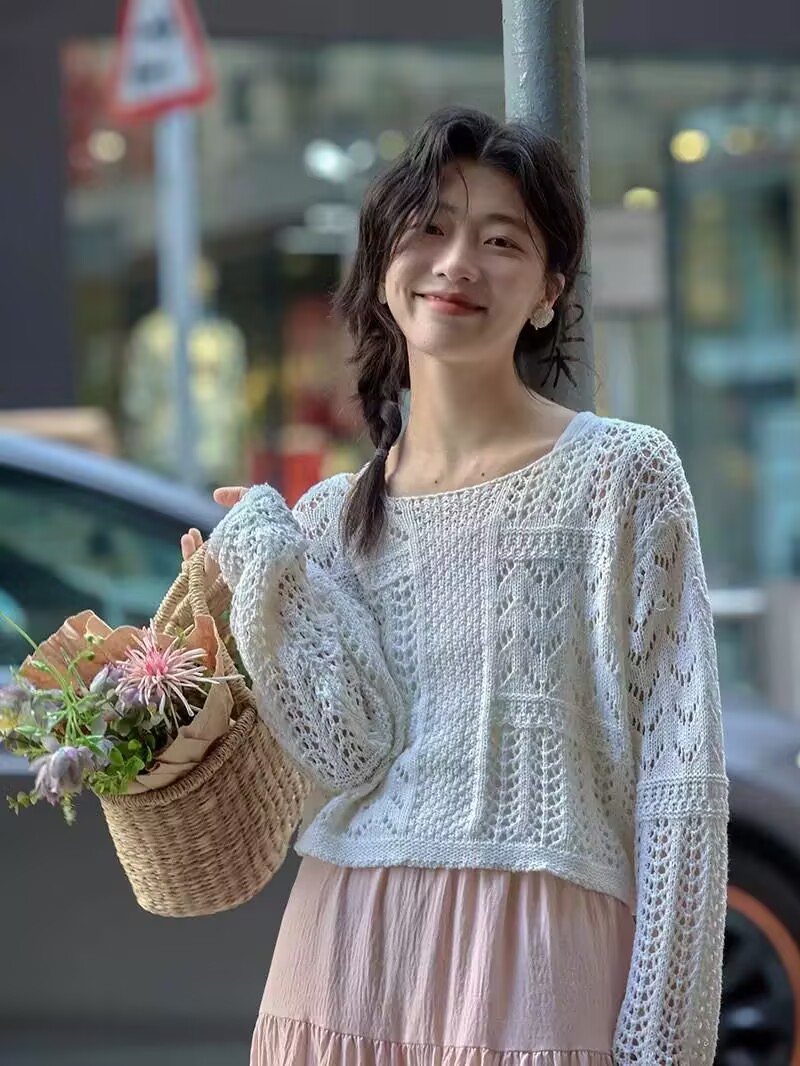 Apricot color hollow sweater for women in spring chic Korean style atmosphere and temperament super good-looking gentle and unique top