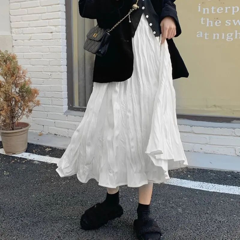 百褶半身裙女2025春秋新款中長款不規則裙子白色高腰顯瘦壓褶裙