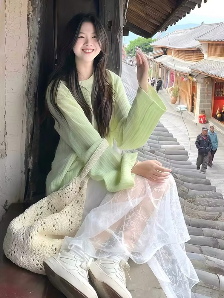 Spring outfit 2025 high-end hollow hook sweater sunscreen blouse unique and beautiful early spring light green top for women