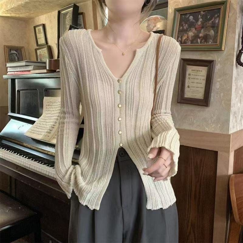 Irregular slit V-neck long-sleeved sweater for women in summer thin vacation sunscreen air conditioning shirt top