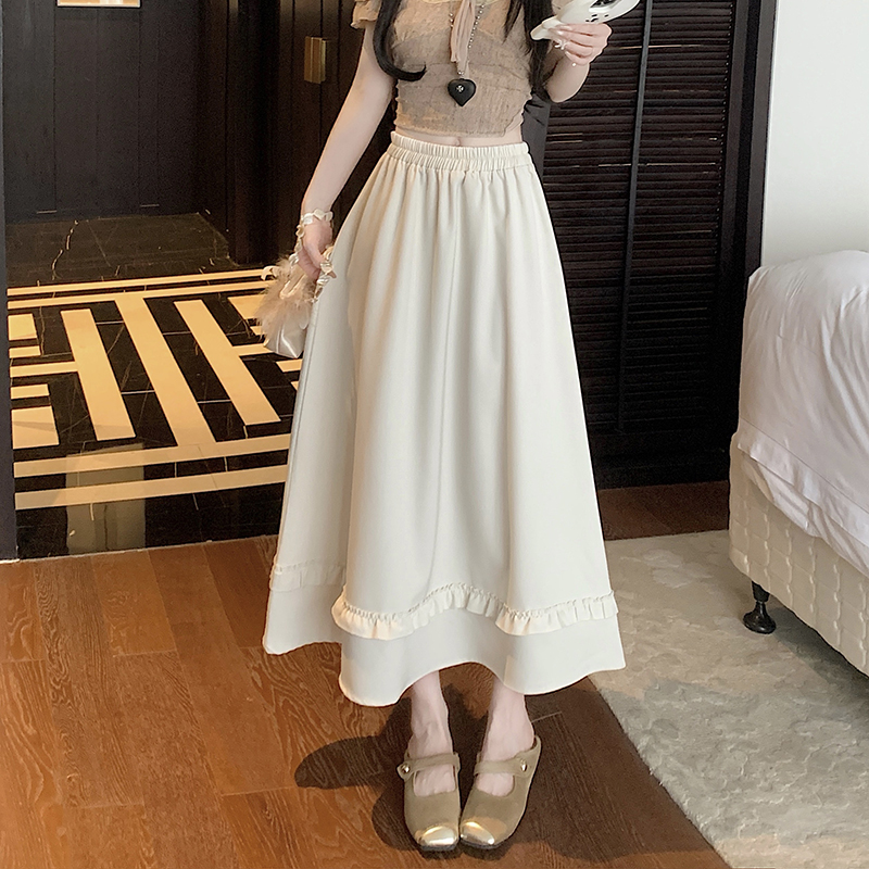 Real shot 2025 spring and summer new spliced ​​black ear skirt high waist slim looking at a long skirt umbrella skirt