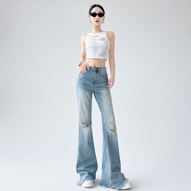 Real shot of 2025 spring retro washing ripped high-waisted slightly flared jeans for women slim slim fringe flare trousers