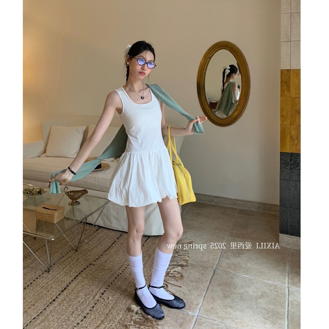 A casually created white flower bud dress for women with inner lining and slimming short vest skirt for women in summer