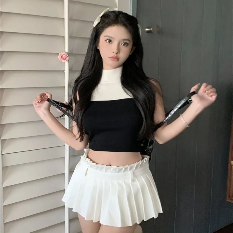 天貓質量辣妹風設計感小眾夏季新款拼色無袖針織修身短款上衣