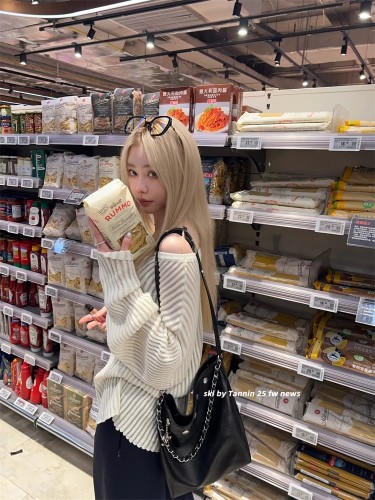 ski by Tannin Red Rabbit three-color paper piece people pit strips slightly transparent lazy sweater loose slim hollow top