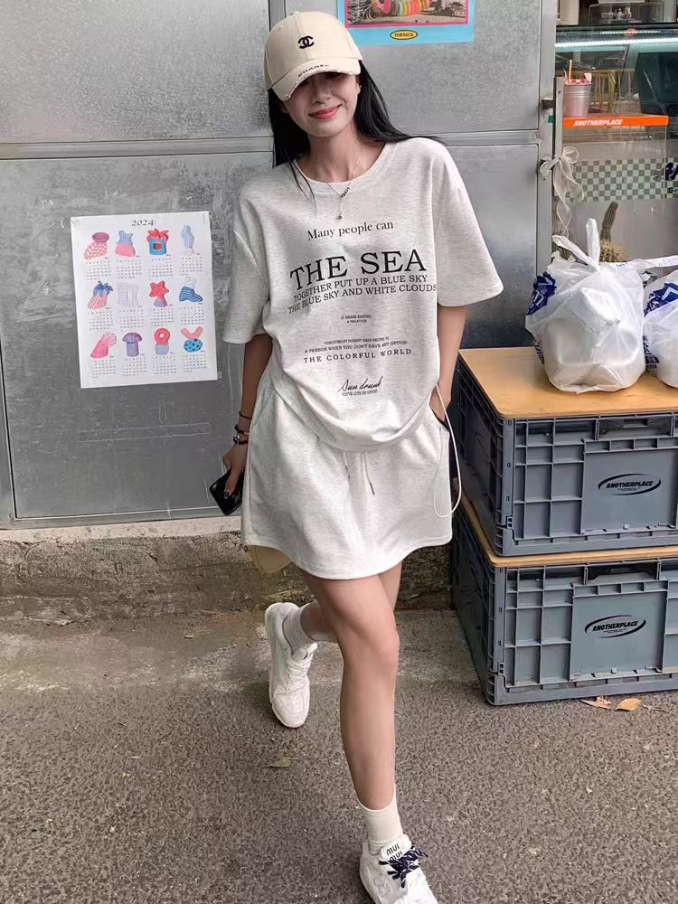 韓版休閒運動風套裝女夏季寬鬆減齡抽繩短袖包臀A字短裙兩件套潮