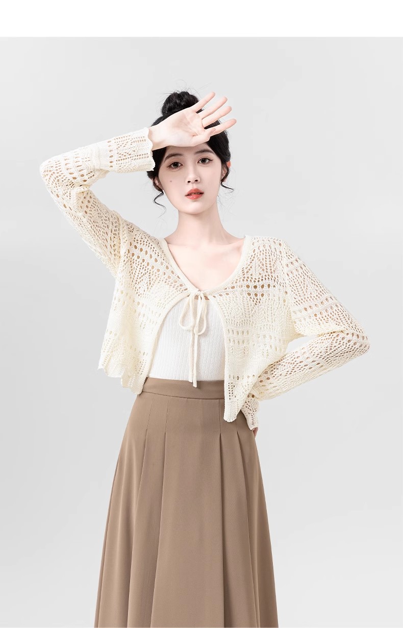 Hollow ice silk knitted cardigan for women in summer 2025 new air conditioning shirt suspender outer sunscreen shirt short top