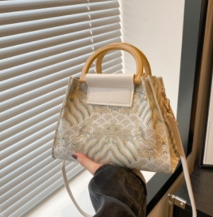 Shangxin retro embroidered Feng Shui bucket bag large capacity fashionable casual and fashionable handbag splicing single shoulder diagonal strap bag