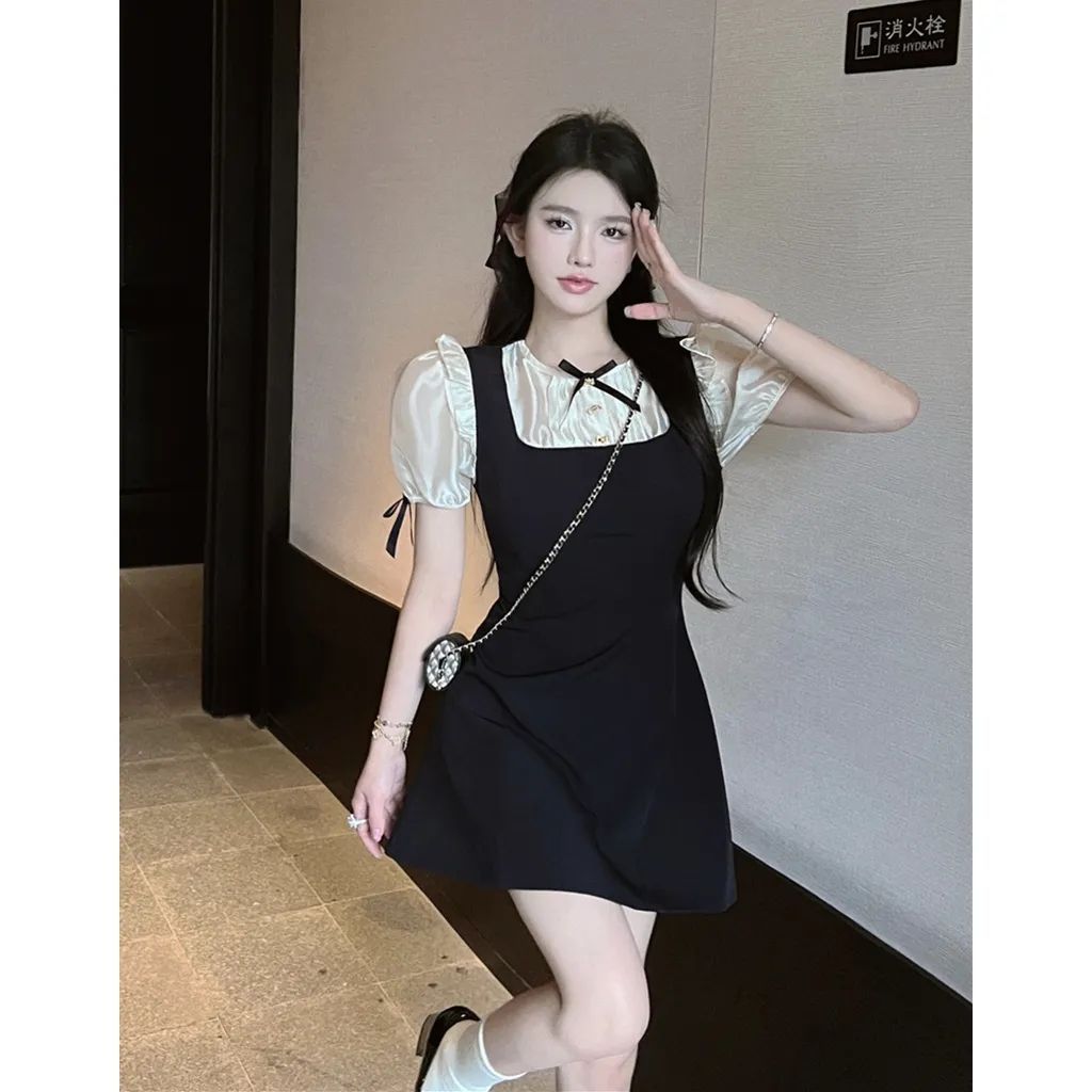 Retro sexy bow temperament small black skirt fake two-piece spliced ​​hip-pack dress for women 2025 summer new style