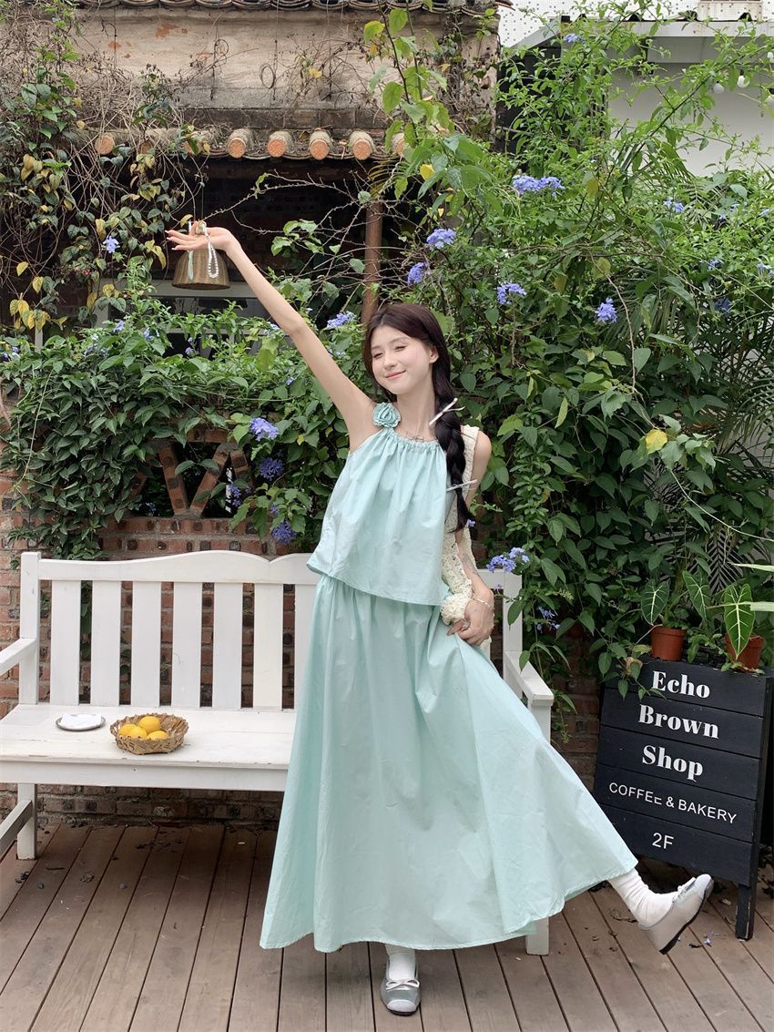 Small fresh mint green suit for women in summer vacation style short suspender vest high waist A-line skirt two-piece set