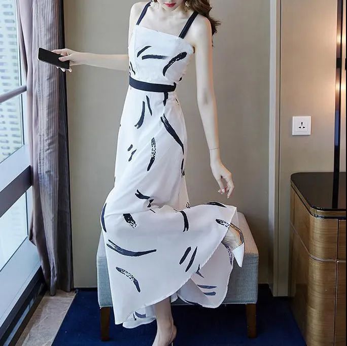 Retro high-end suspender dress for women in summer French waist-hugging slim long skirt design high-end mid-length skirt