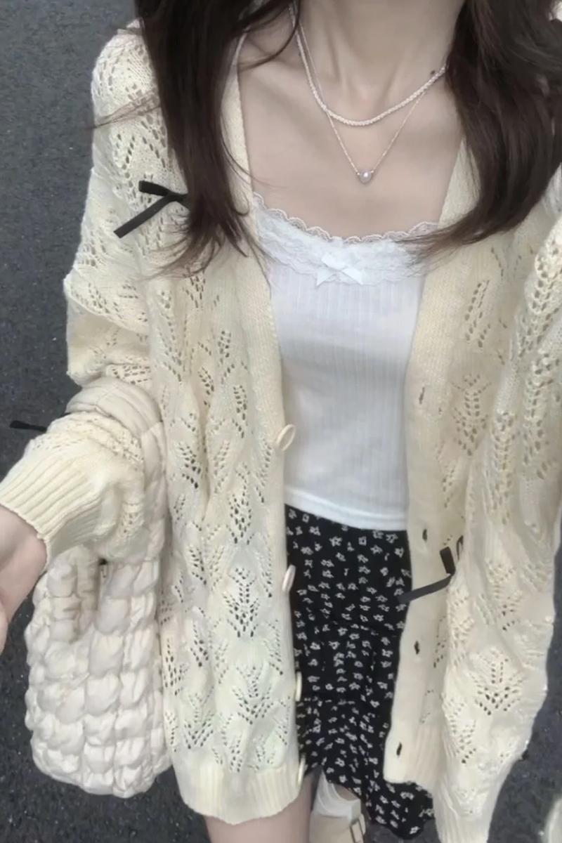 College style hollow bow design feel loose long-sleeved top knitted fashionable casual