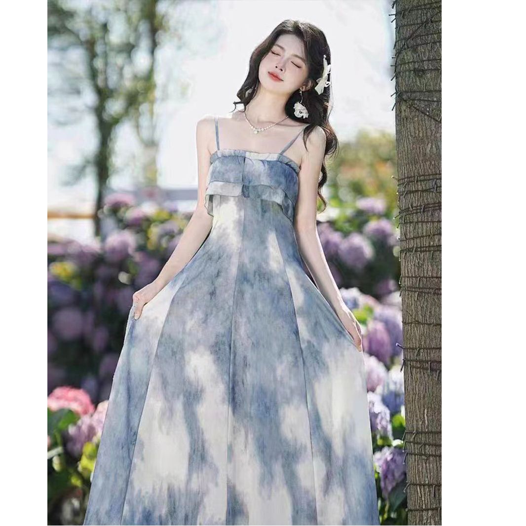 French lazy vacation dress for women in spring and summer American high-end fashion suspender skirt design slim midi skirt