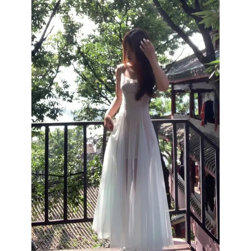 Chic and beautiful mesh suspender dress for women 2025 summer French elegant temperament waist-hugging and slim fairy long skirt